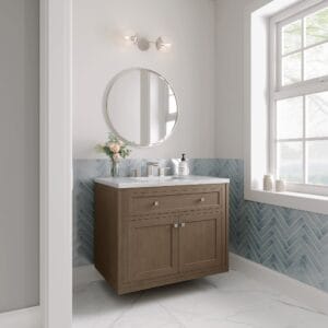 Modern bathroom vanity with round mirror.