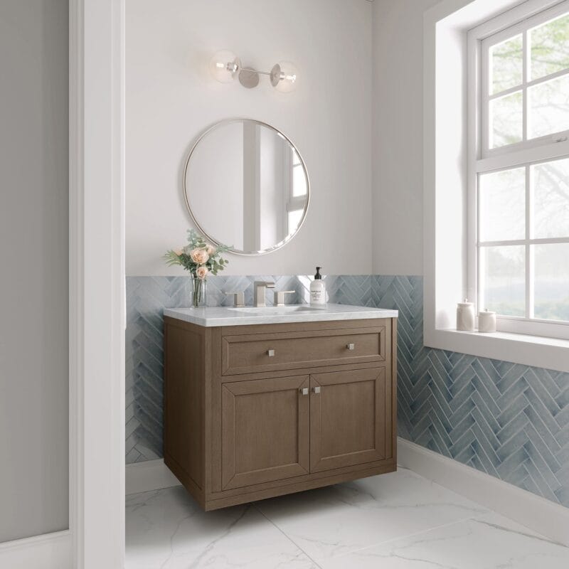 Modern bathroom vanity with round mirror.
