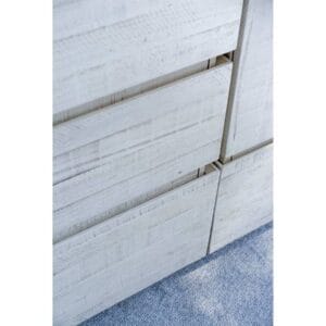 Textured white wooden cabinet drawers