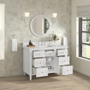Elegant white vanity with multiple drawers.