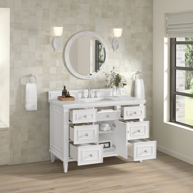 Elegant white vanity with multiple drawers.
